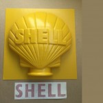 V108 - Half Shell Globe Sign in yellow with decals supplied